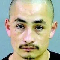 Jorge Cajiga-Ruiz, a young man with a shaved head and a thin mustache